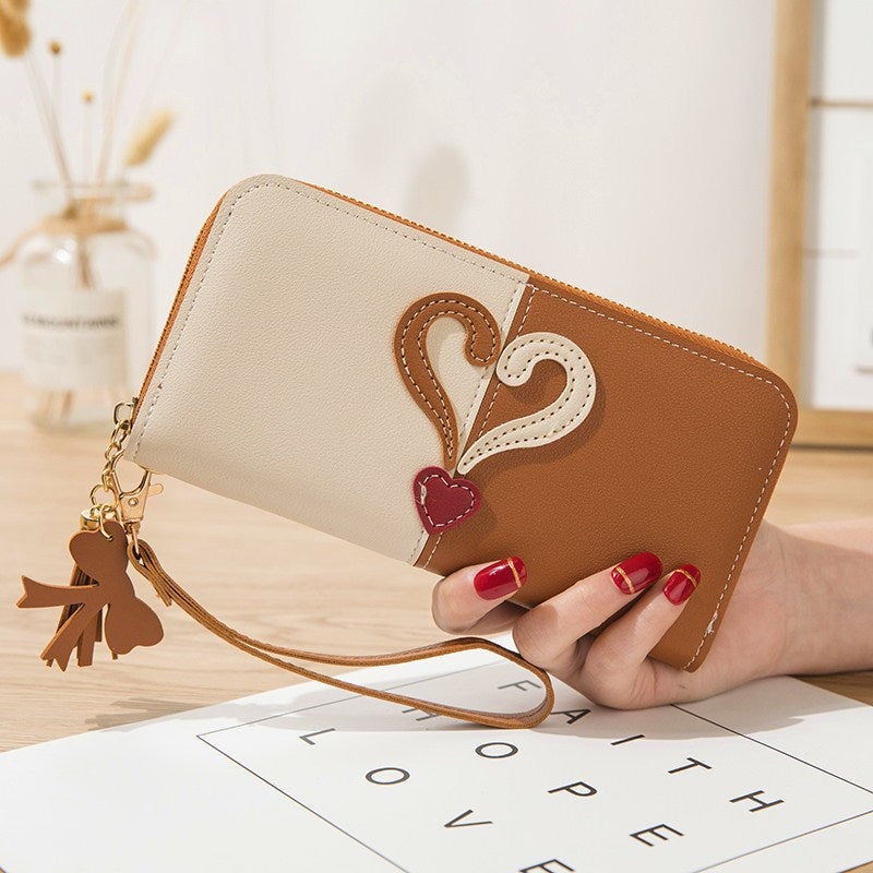 Stylish wallet with heart appliqués Kalsten