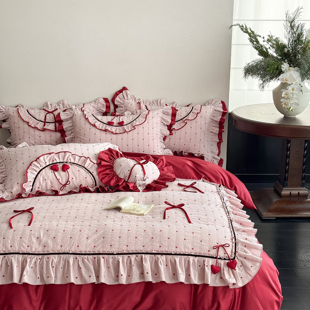 Romantic cotton bedding set with ruffle, heart embroidery and decorative pillow Kalsten