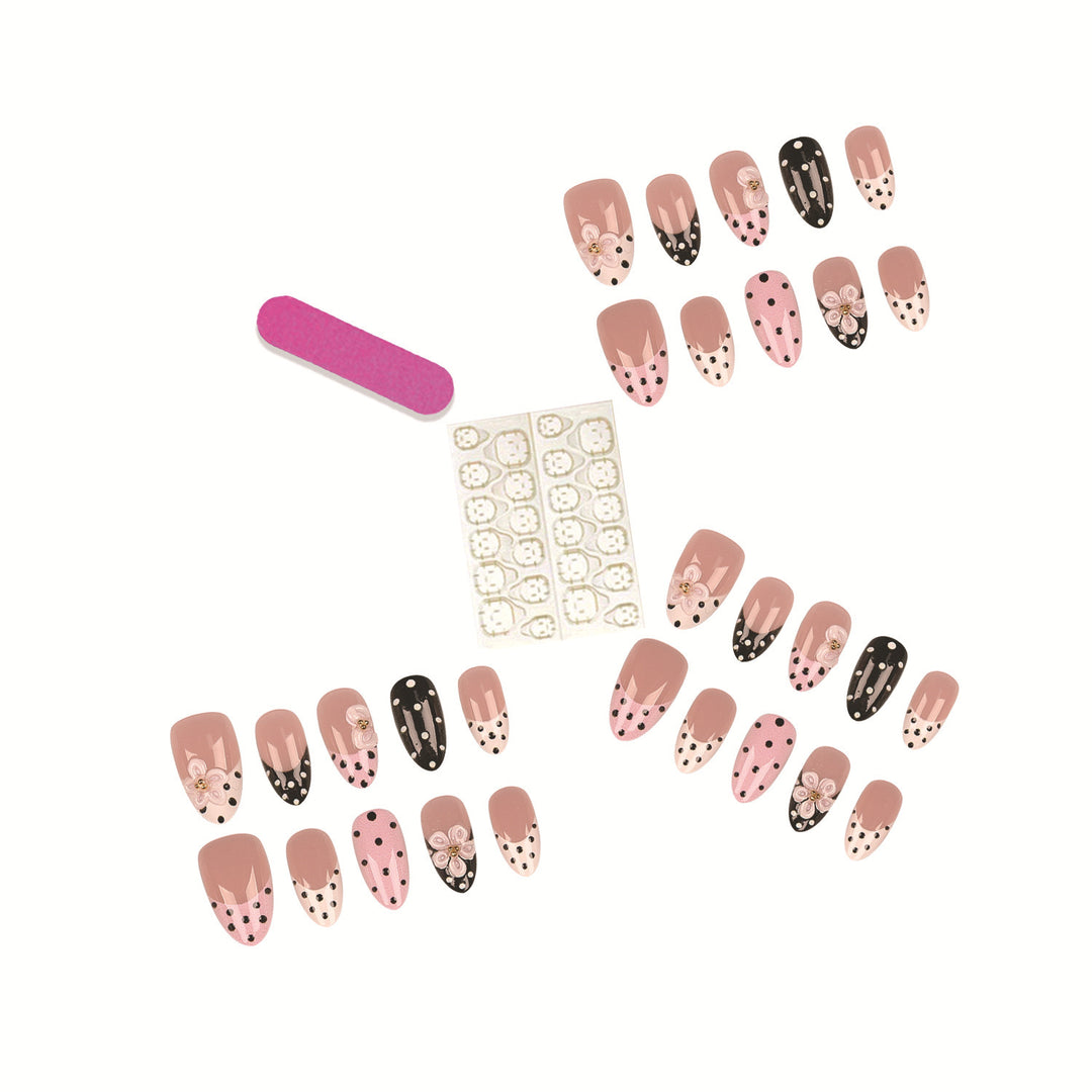 Artistic Press-On Nail Set Featuring Floral and Polka Dot Designs