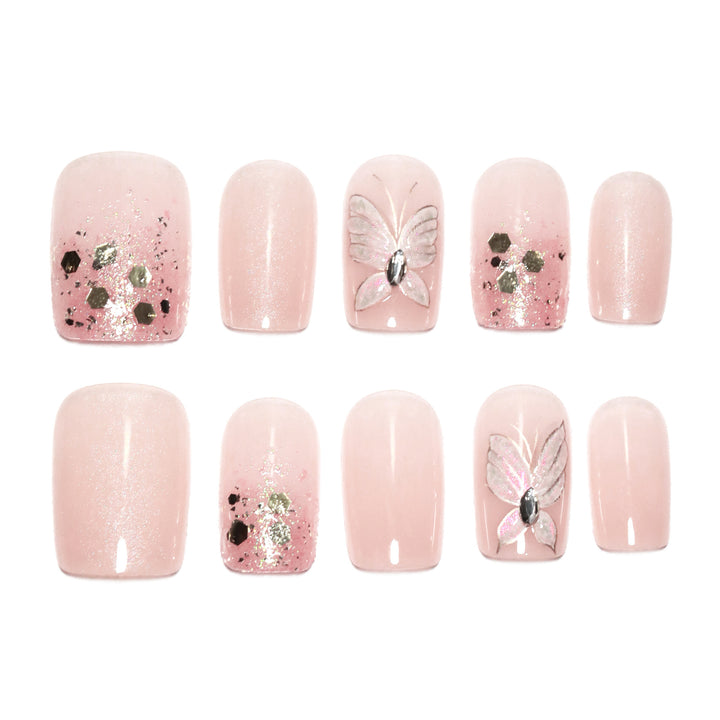 Artful nail art with butterfly designs and glitter accents Kalsten