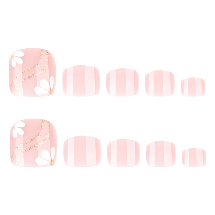 Nail art with elegant blooming designs and glitter accents Kalsten