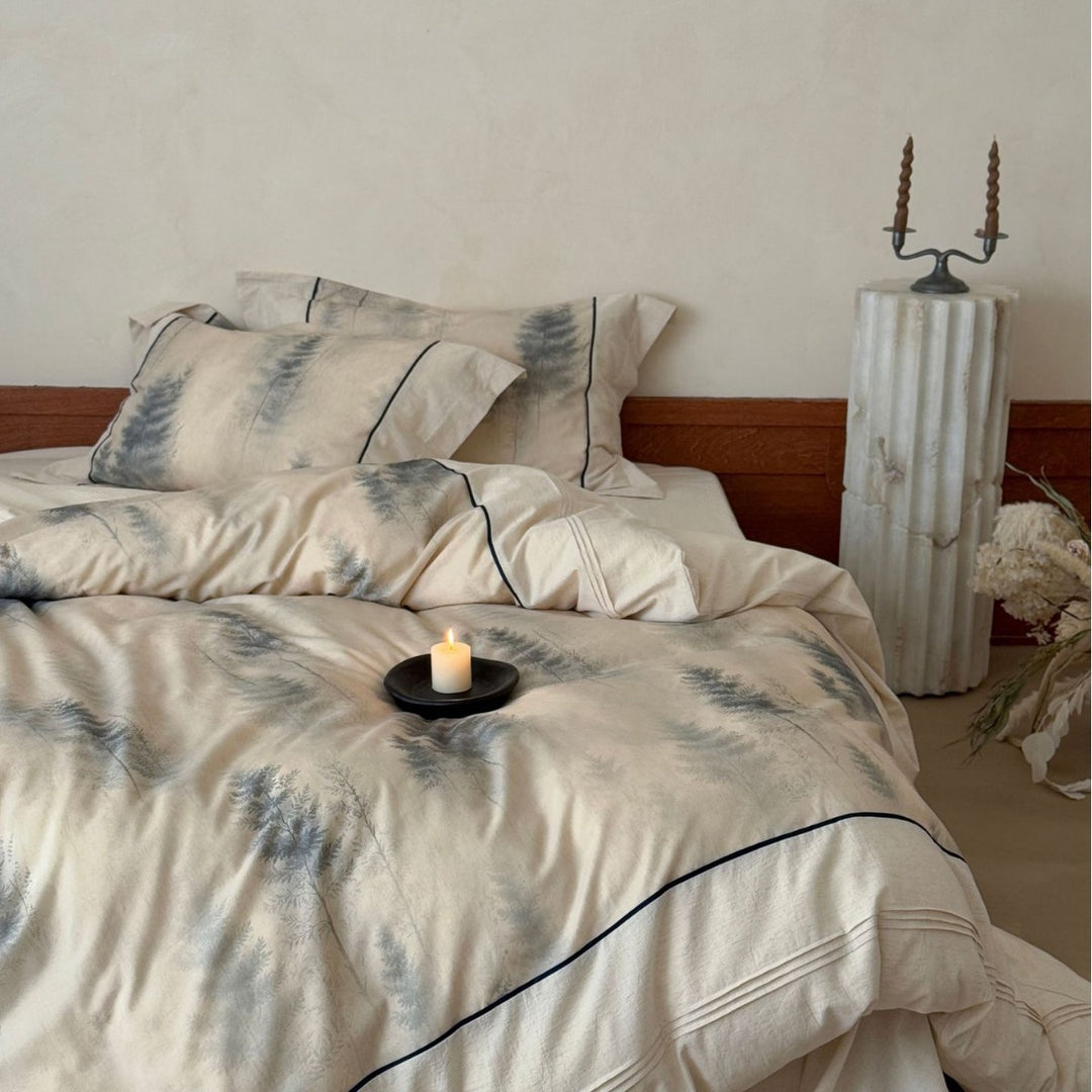 Bedding set made of high-quality cotton satin with subtle forest watercolor print and contrasting piping