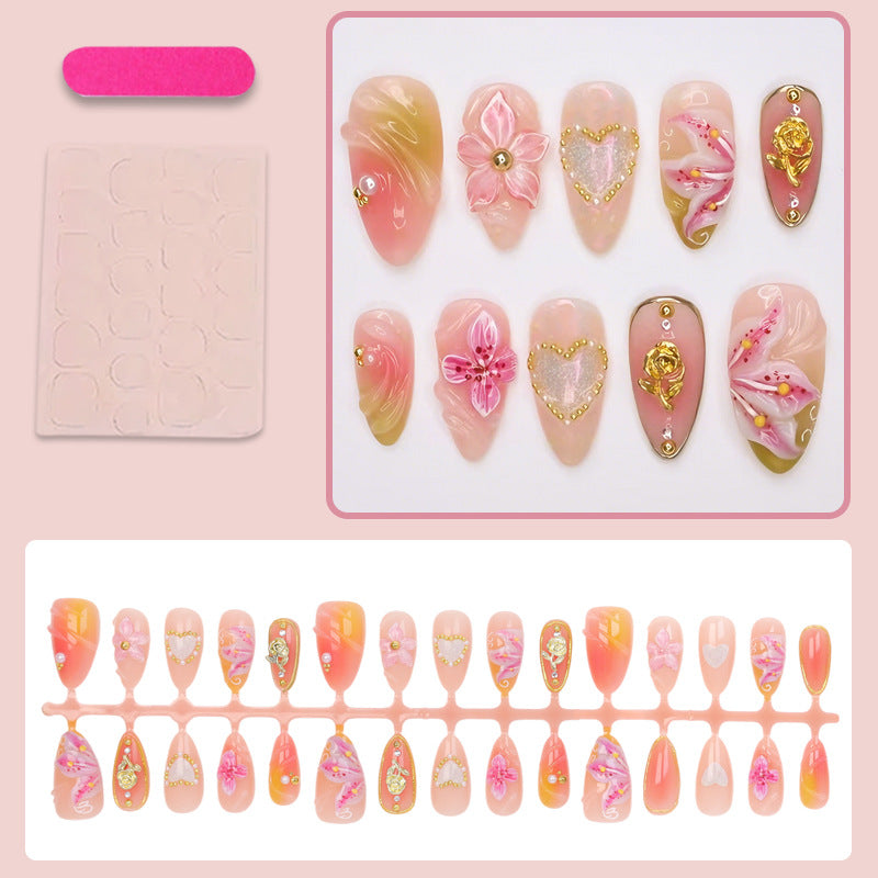 Artificial nail set with delicate flower designs and glamorous accents Kalsten