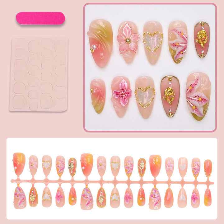 Artificial nail set with delicate flower designs and glamorous accents Kalsten