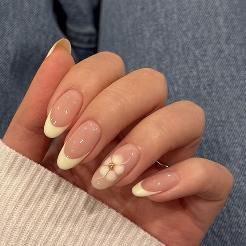 Acrylic nail set with elegant blue and nude color accents Kalsten