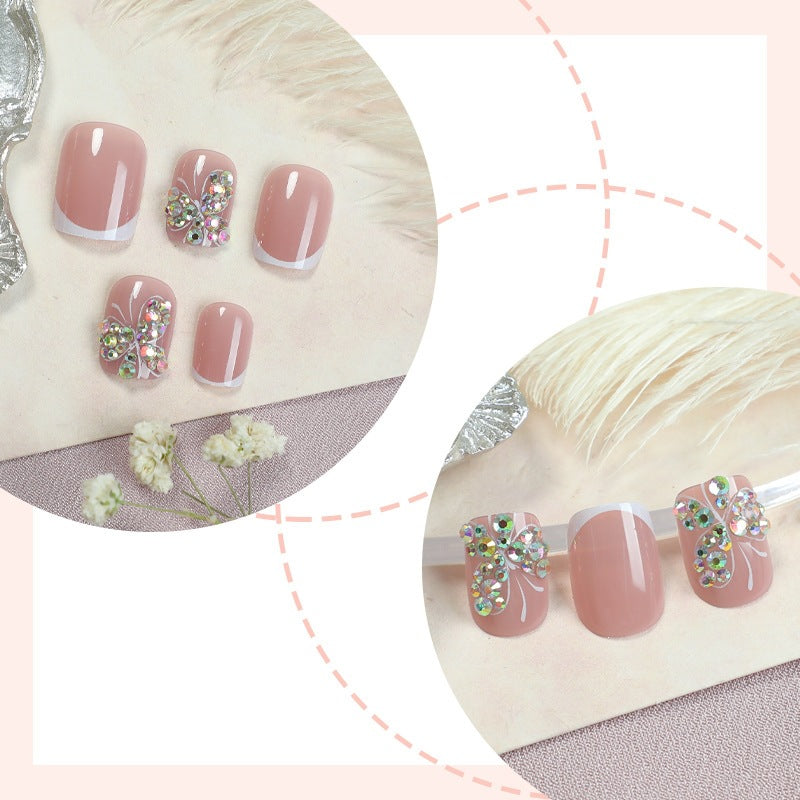Artifical nail set with sparkling accents and elegant bows Kalsten