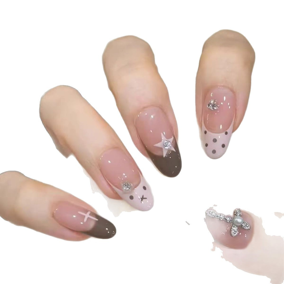 Artistic Press-On Nail Design with Decorative Accents Kalsten
