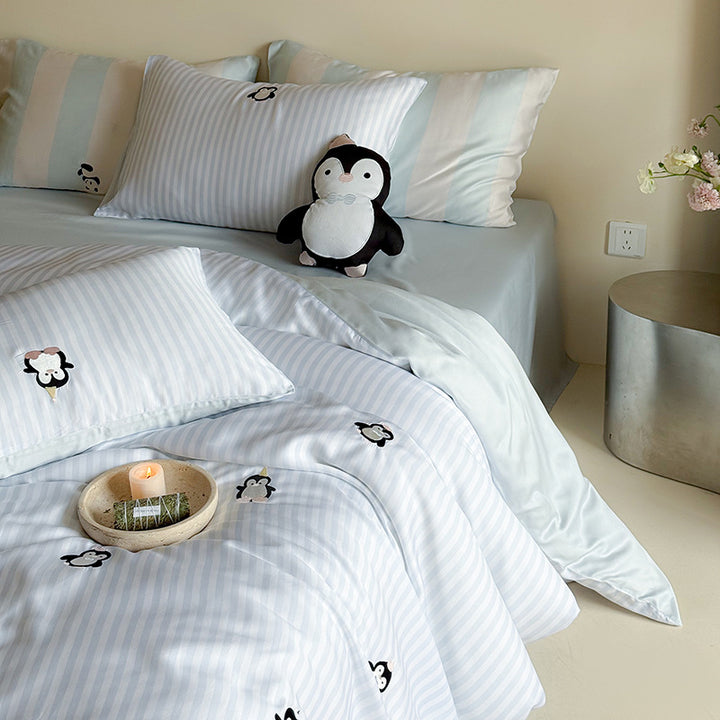 Satin bedding set with silky glossy striped design and subtle panda illustration