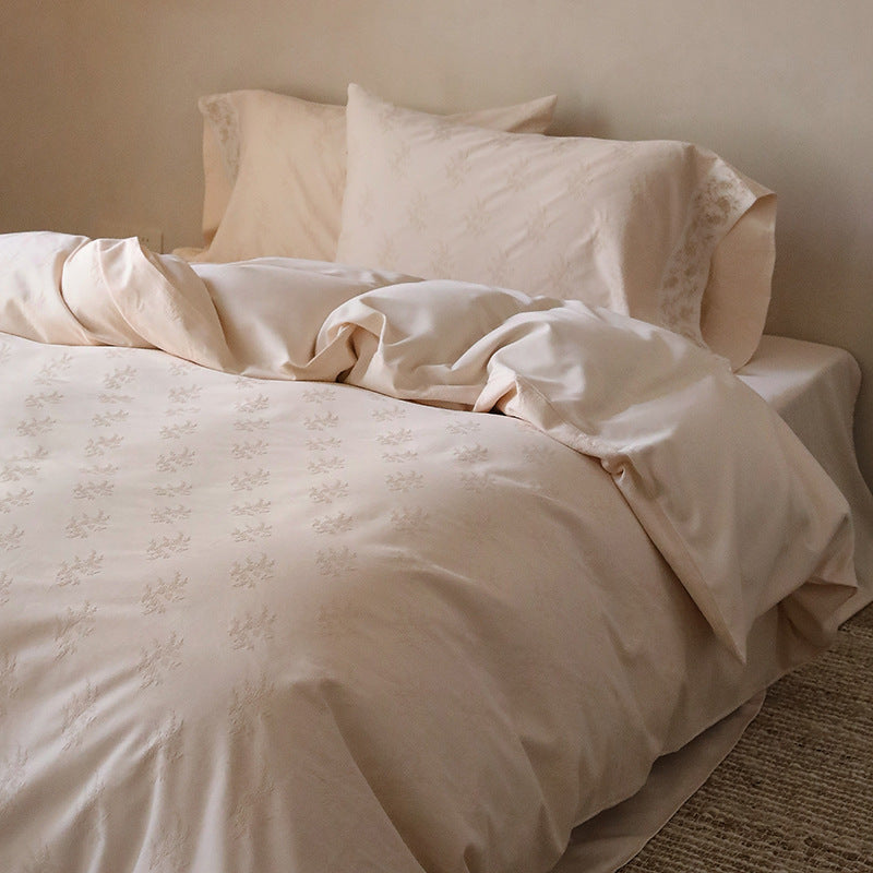 Exclusive cotton satin bedding set with tonal floral jacquard and fine decorative embroidery