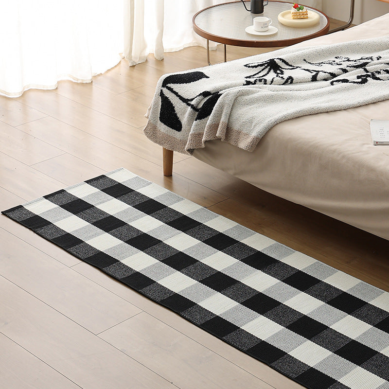 Flat runner rug made of cotton blend with checked woven structure