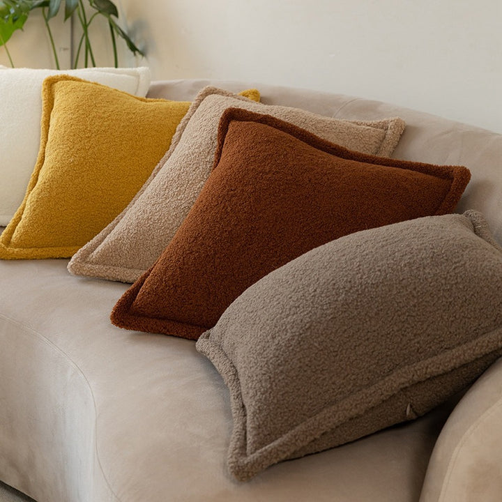 Decorative teddy fleece cushion with padded filling and piped seam