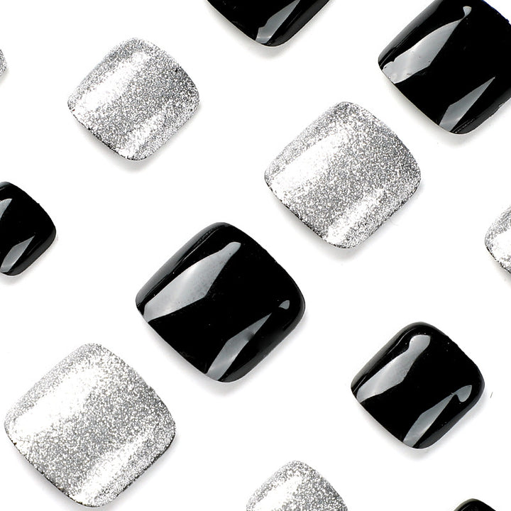Artful toenail art with glitter and black design Kalsten