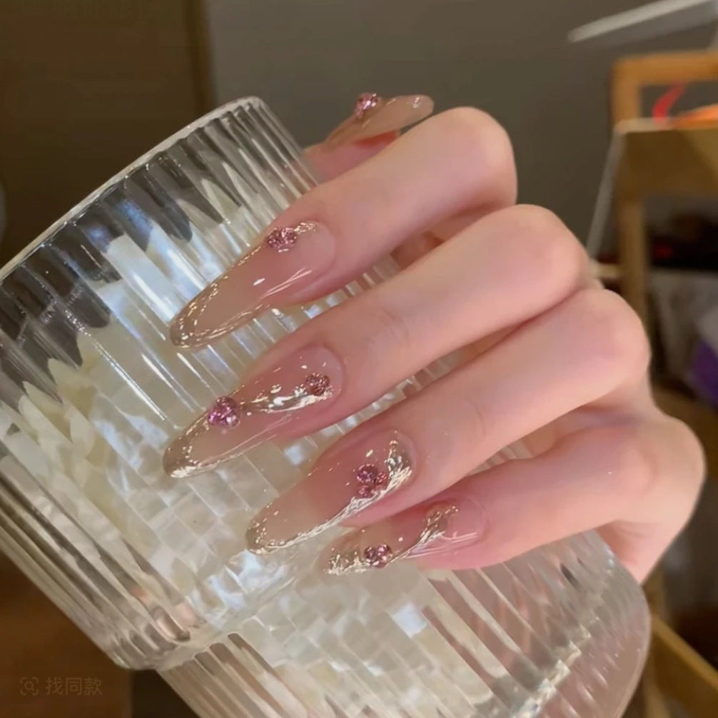 Decorative Acrylic Nail Extensions with Floral Accents