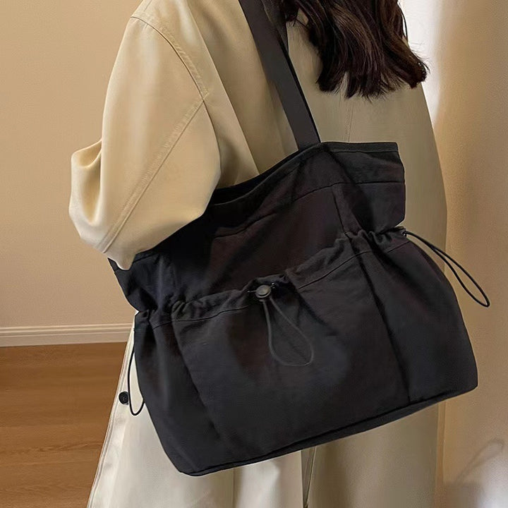 Practical everyday handbag with drawstring Kalsten
