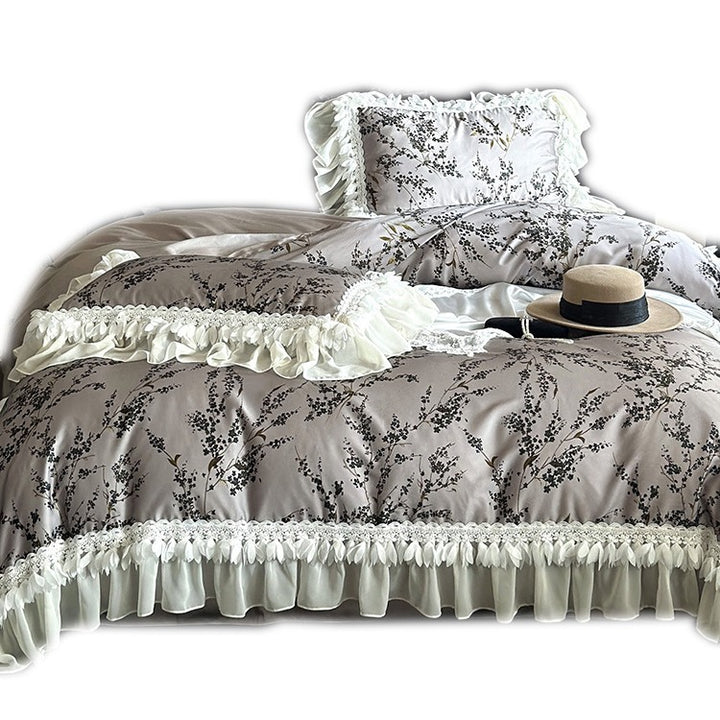 Satin bedding set with floral print duvet, tiered ruffle pillow & lace trim