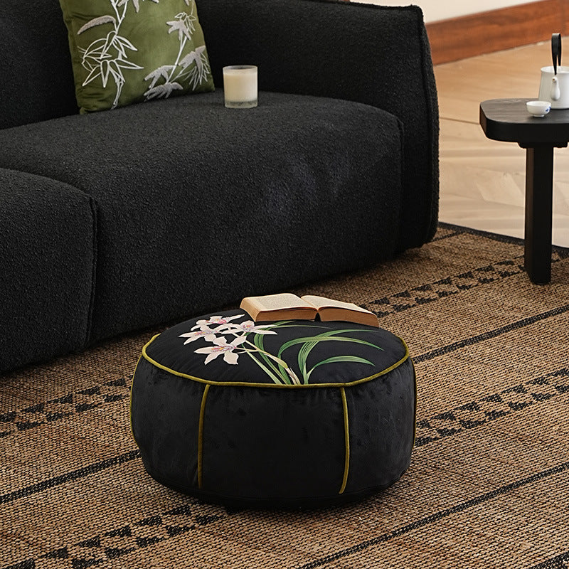 round floor sitting pouf with butterfly motif and sturdy canvas cover Kalsten