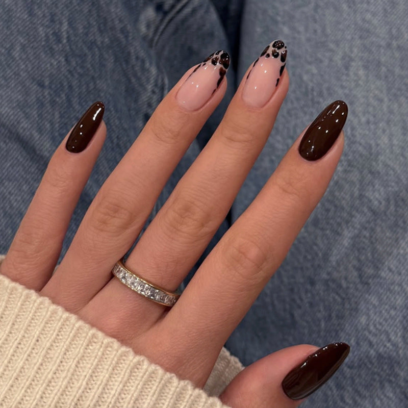 Artful stiletto nails with elegant design and glossy finish Kalsten