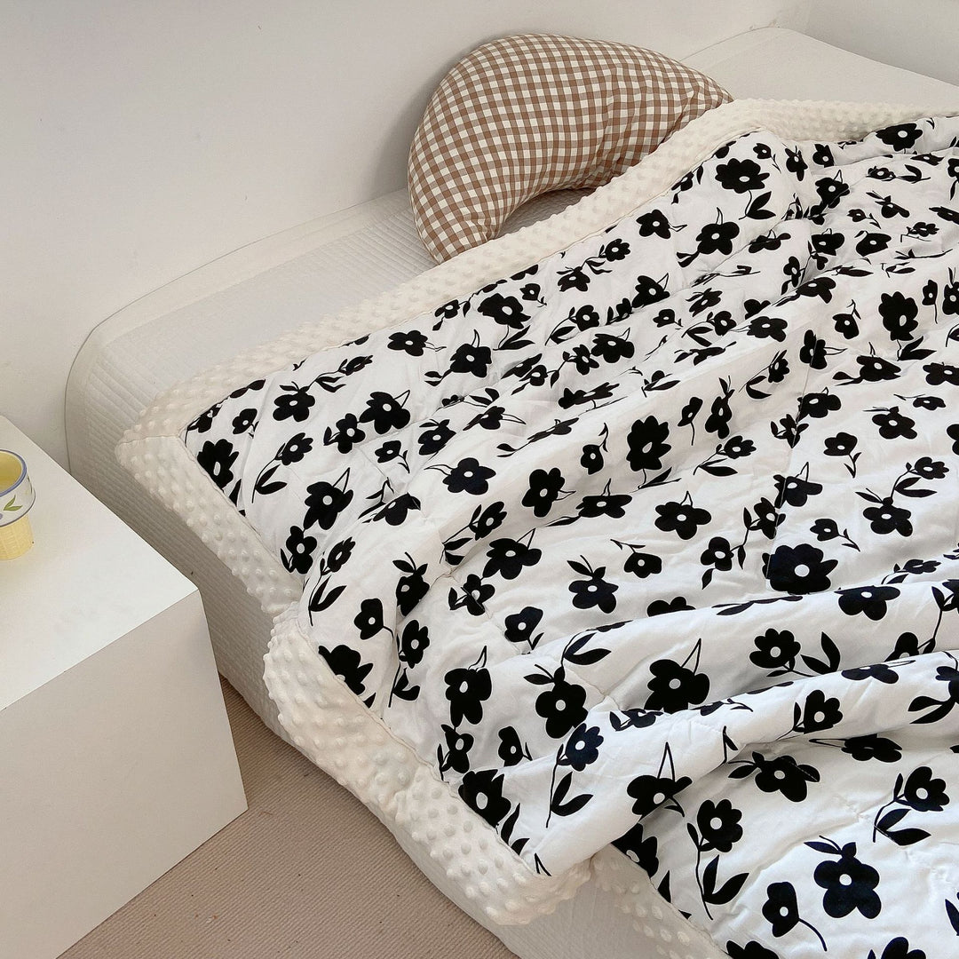 Cozy baby quilt with minky fleece border and cute rabbit print