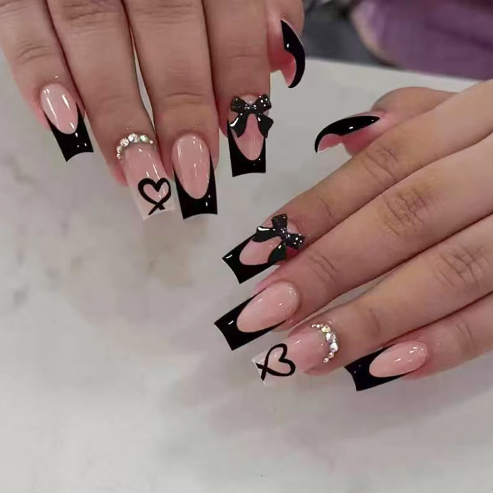 Decorative Long-Stiletto Press-On Nails with Heart and Bow Design