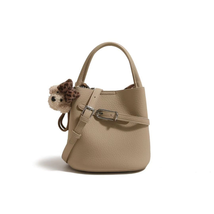 Chic Pebbled Leather Handbag with Cute Charm