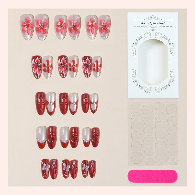 Artificial nail set with floral designs and glitter elements Kalsten