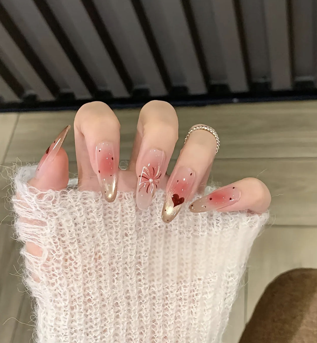 Artistic Press-On Nail Design with Floral and Gemstone Accents Kalsten