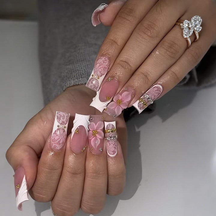 Artificial nail set with floral designs and sparkling accents Kalsten