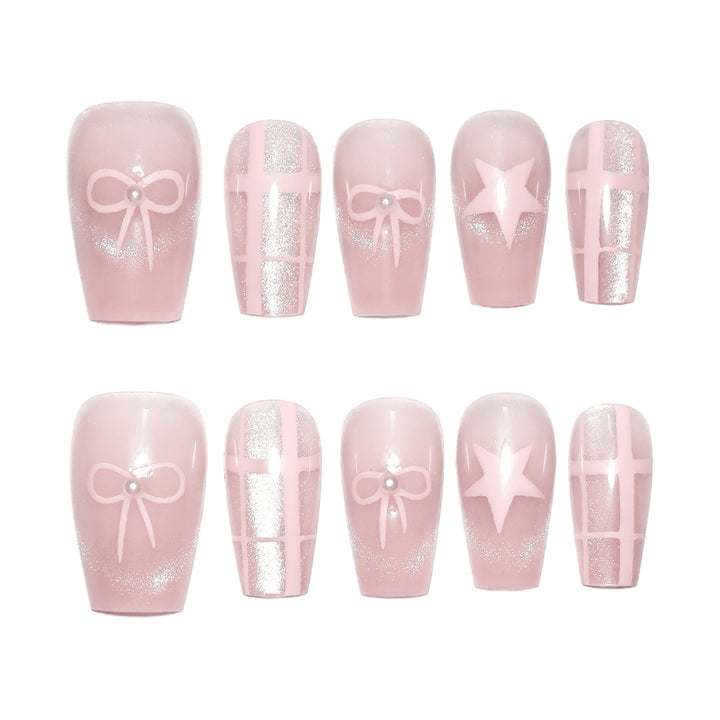 Artistic acrylic nails with elegant bow and star designs Kalsten
