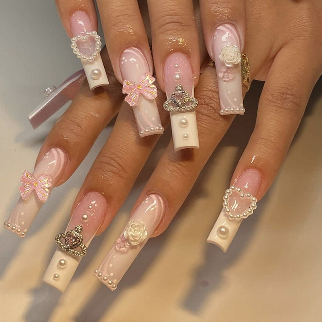 Creative acrylic nail set with delicate pearl and gloss accents Kalsten