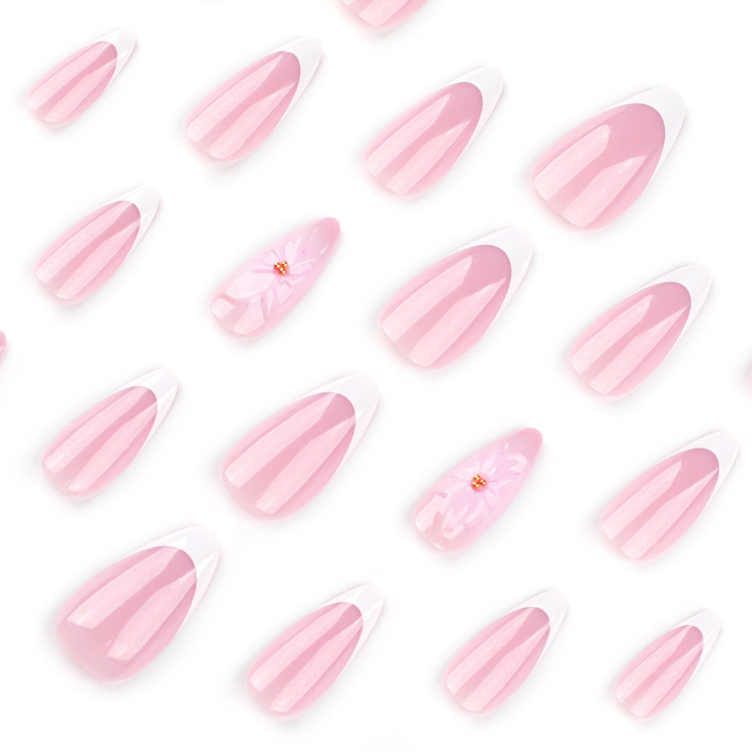 Artistic French-Tip Nail Extensions with Flower Accents Kalsten