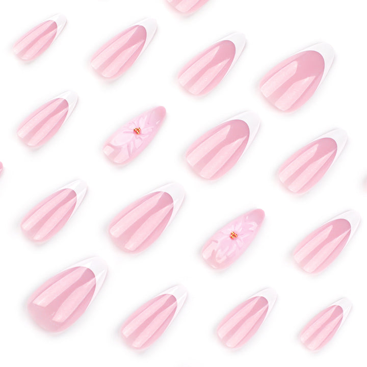 Artistic French-Tip Nail Extensions with Flower Accents Kalsten