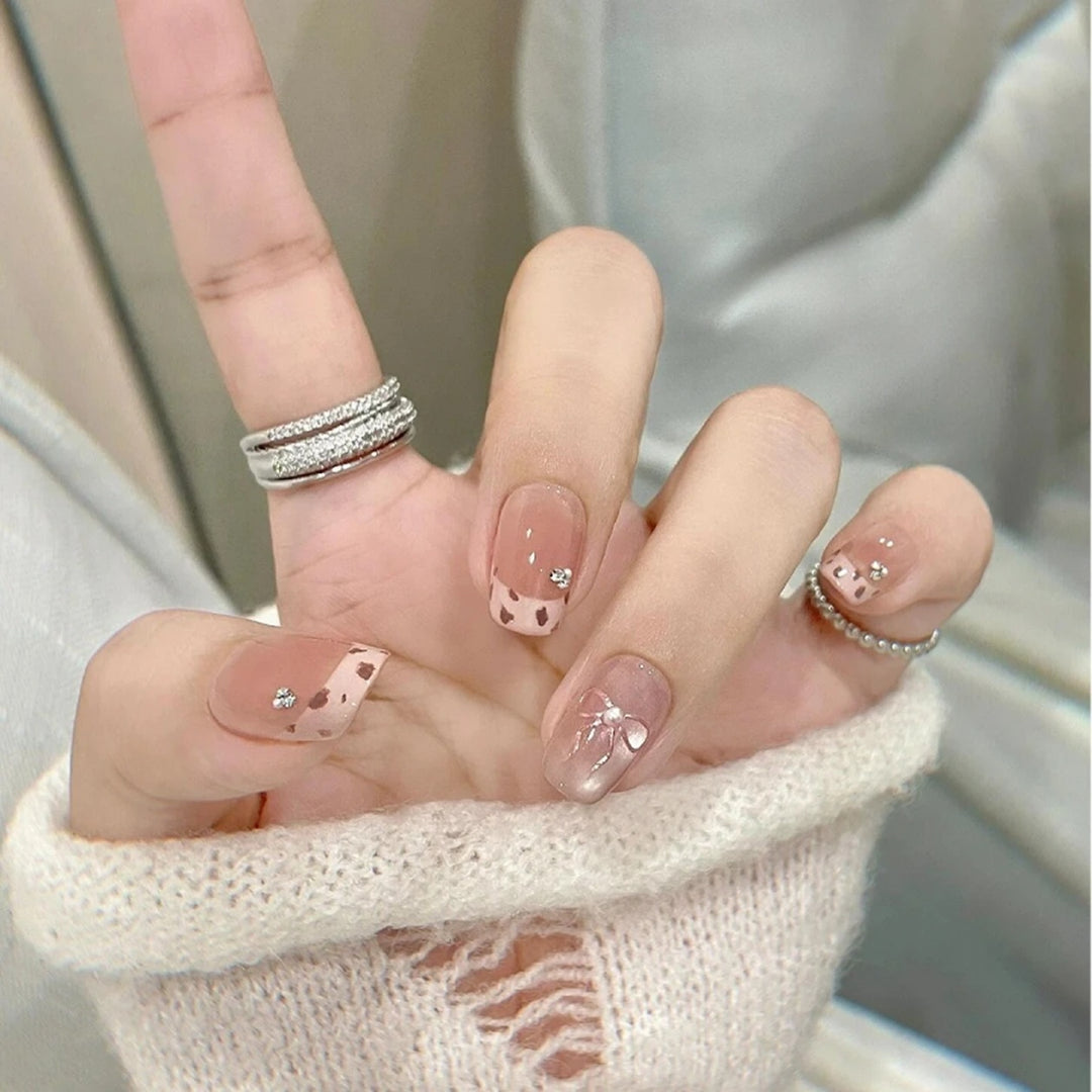 Decorative Nail Art Extensions with Rhinestone Accents