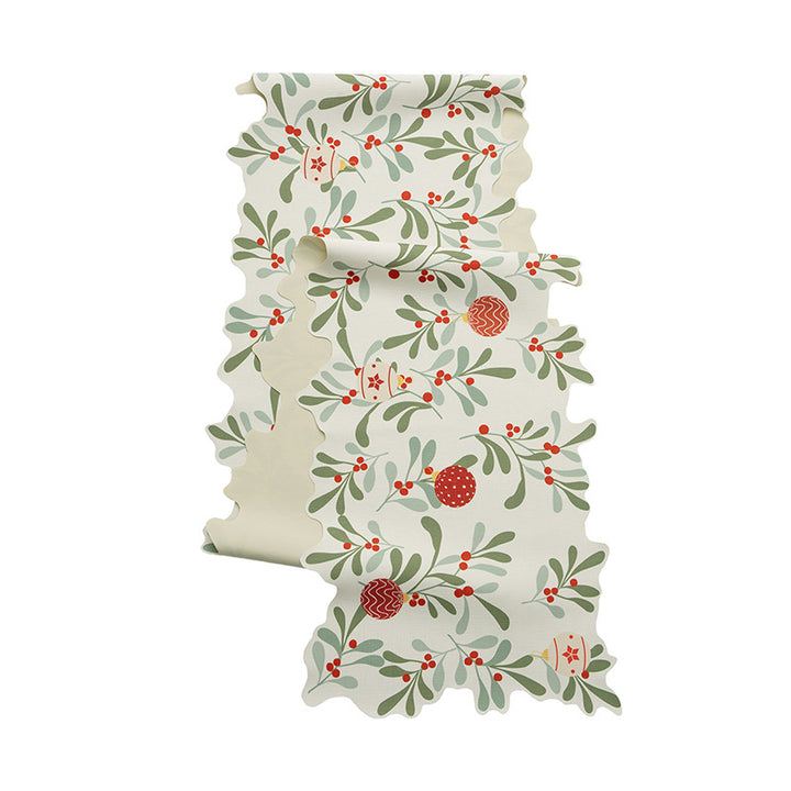 Festive table runner with wavy edge and botanical Christmas motif