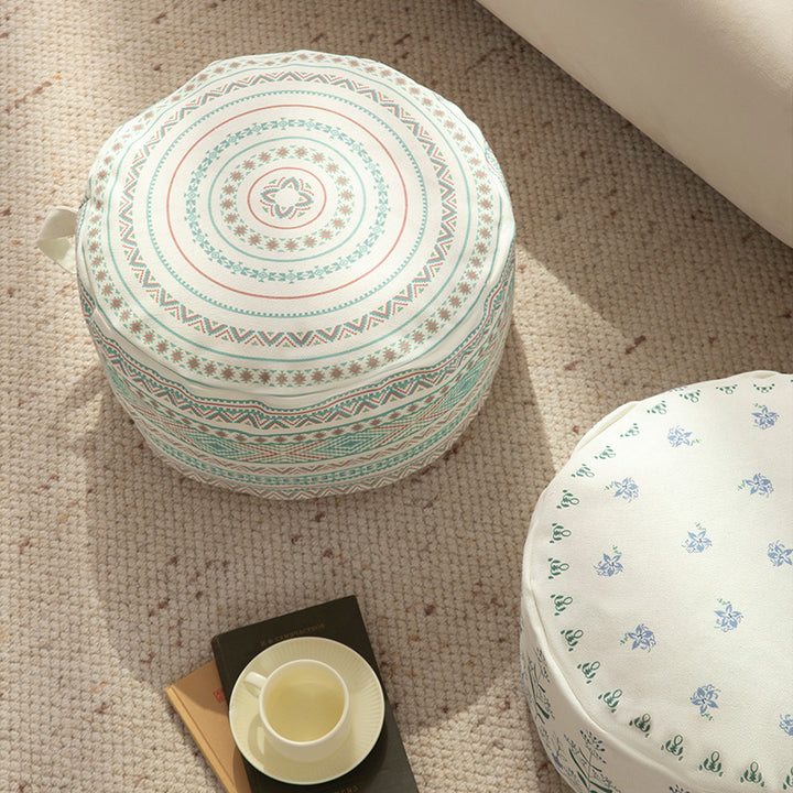 Round floor pouf with ethnic weaving pattern and practical carrying handle Kalsten