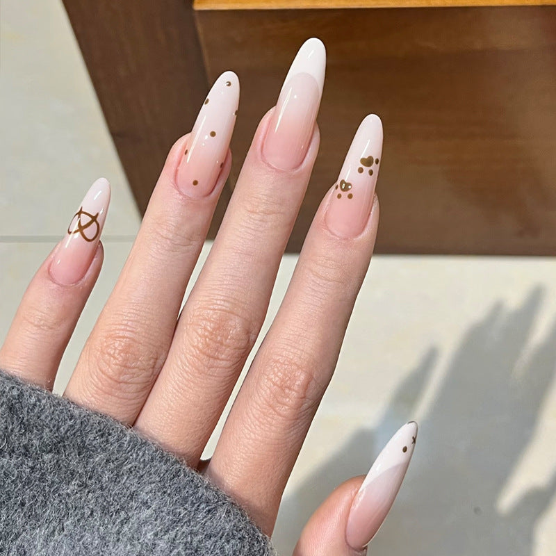 Glamorous Stiletto Press-On Nail Design with Elegant Gold Accents Kalsten