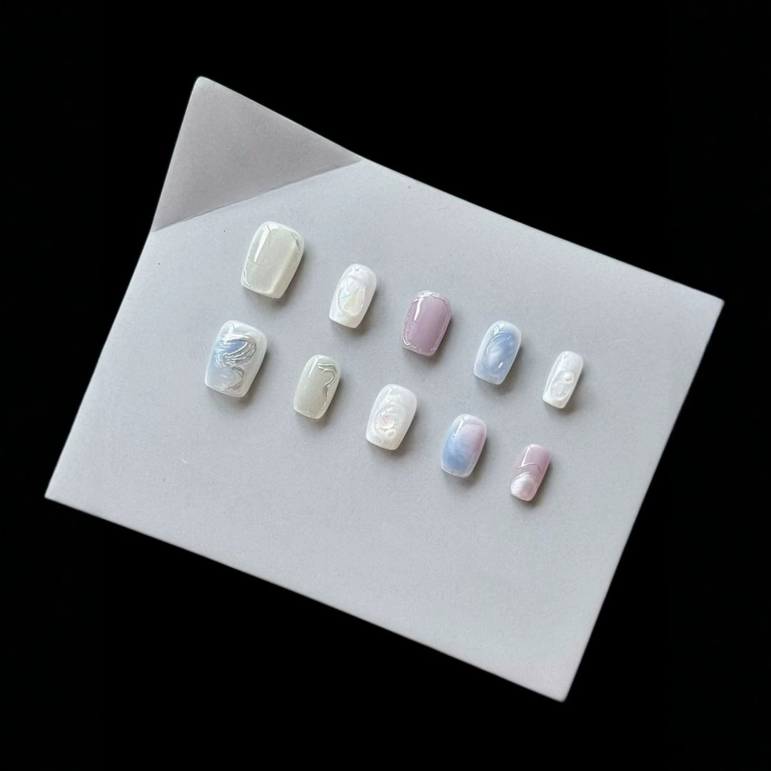 Artistic Press-On Nail Art Set with Pearlescent and Marble Designs
