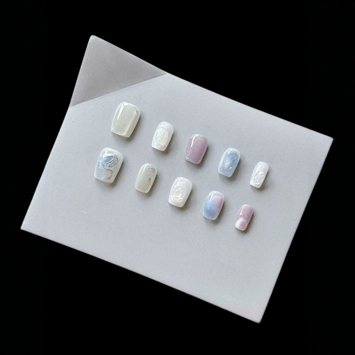 Artistic Press-On Nail Art Set with Pearlescent and Marble Designs