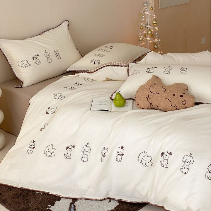 Bedding set made of cotton percale with fine embroidery and cute dog motifs