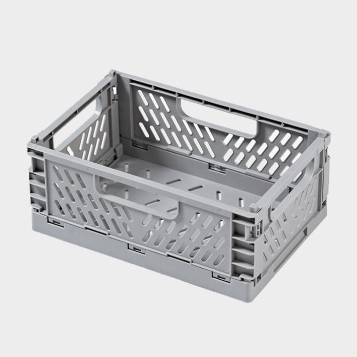 Foldable multi-purpose transport box with ventilation profile and ergonomic grip recesses