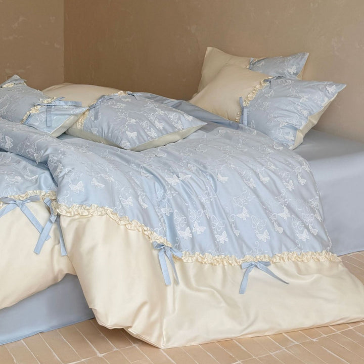Luxurious bedding set with butterfly embroidery, ruffles and decorative bows