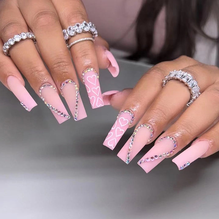 Artful Gel Nails with Elegant Floral Design and Glitter Accents Kalsten
