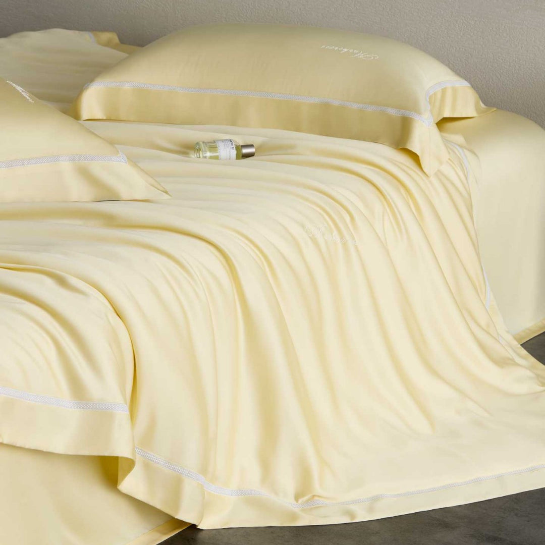 Silky-smooth cotton satin bedding set with fine decorative ribbon and pillowcases