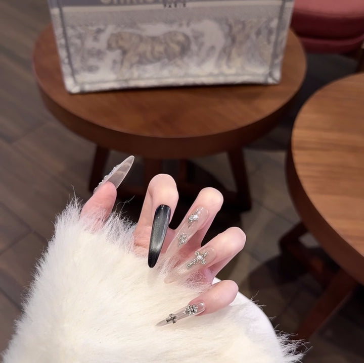 Artistic Long Stiletto Nail Extensions with Crystal Accents