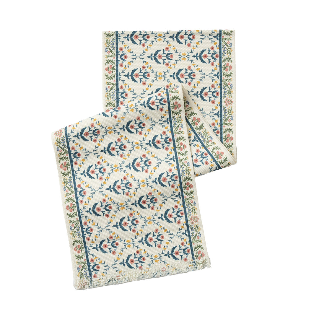 Woven runner with vintage-oriental floral pattern and fringes