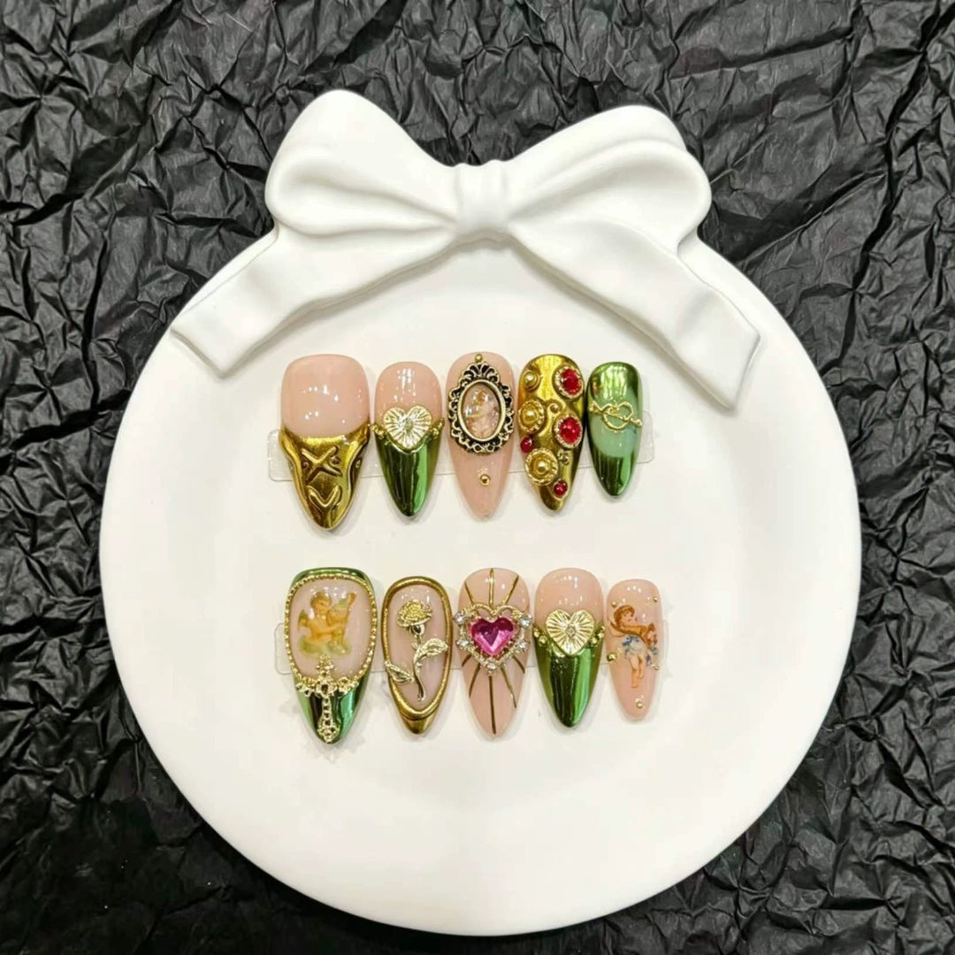 Artistic Press-On Nail Set with Intricate Metallic Accents
