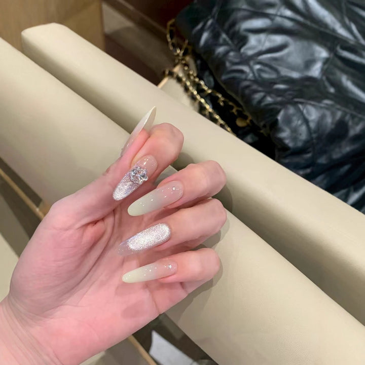 Glamorous Long Stiletto Nail Extensions with Rhinestone Accents