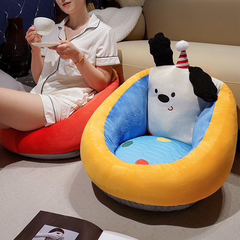 Ergonomic plush cuddle nest for small dogs and cats with raised edge and reversible pillow
