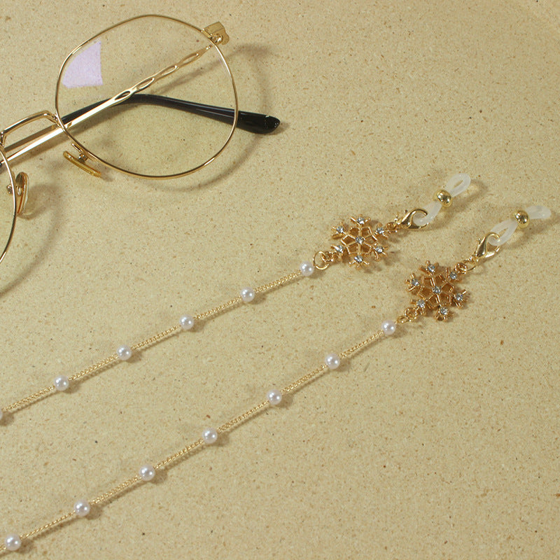 Elegant glasses holder chain with pearls and snowflake pendant Kalsten