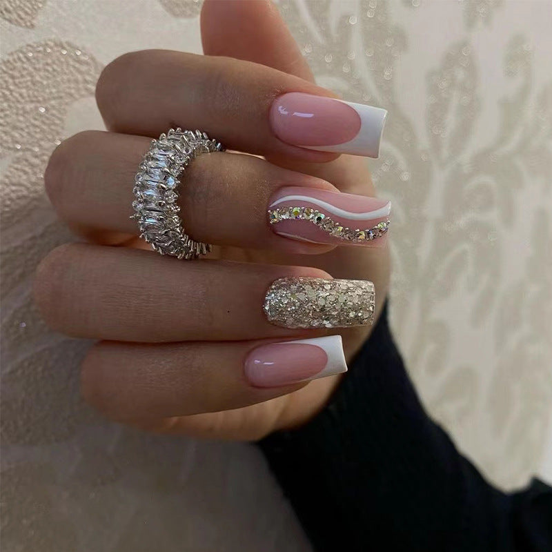 Artistic Nail Art with Glitter and Wave Accents Kalsten