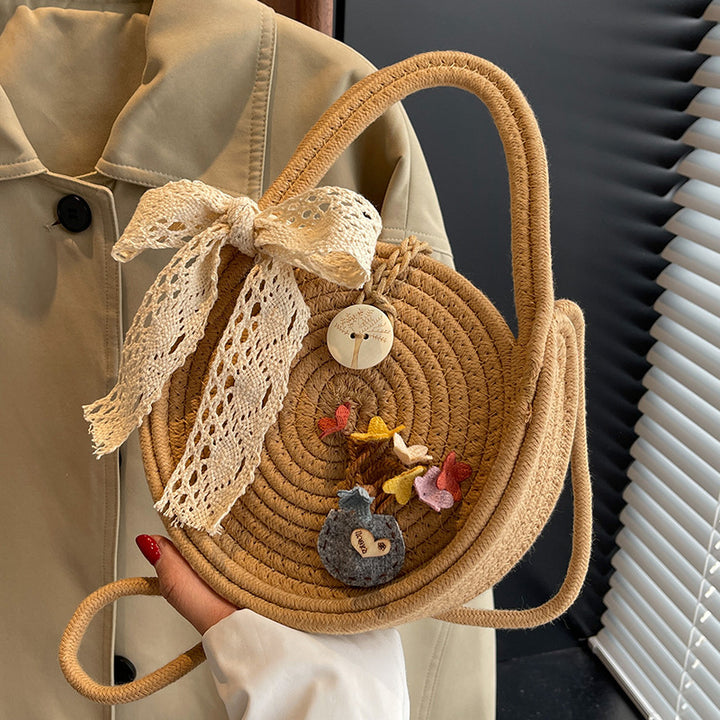 Handcrafted Floral Accent Straw Bag